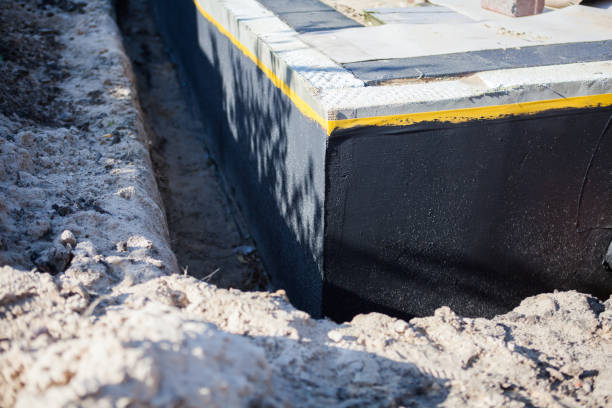 Professional Basement Waterproofing technician working in Richfield, MN